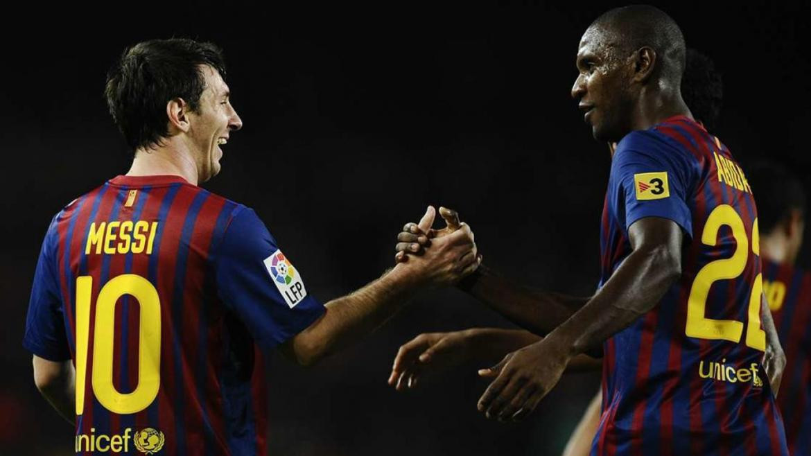 Lionel Messi y Eric Abidal