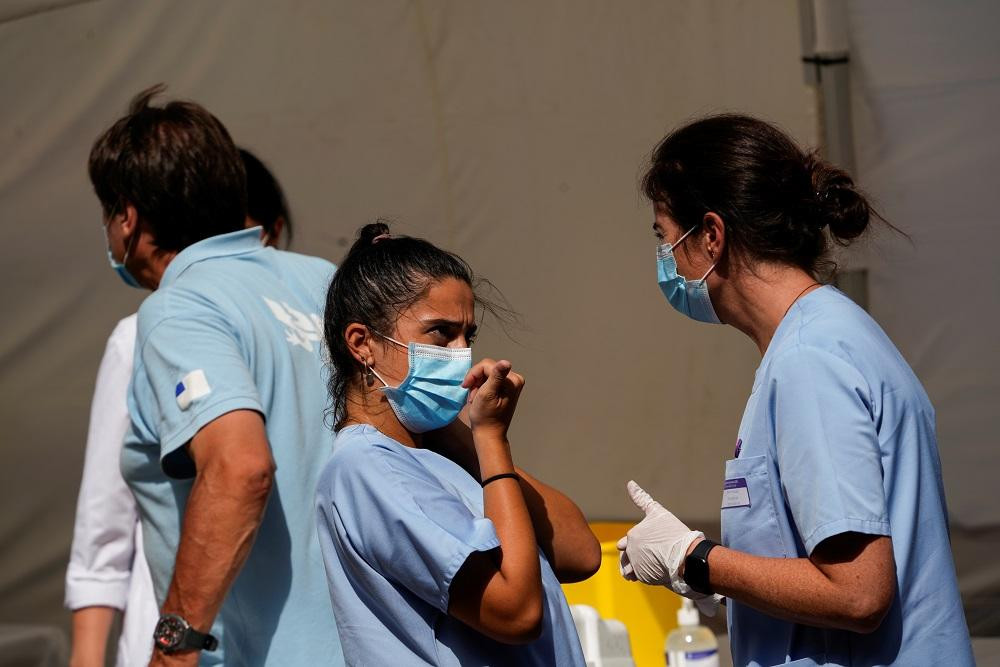 Coronavirus, España, pandemia, uso de barbijos, Reuters