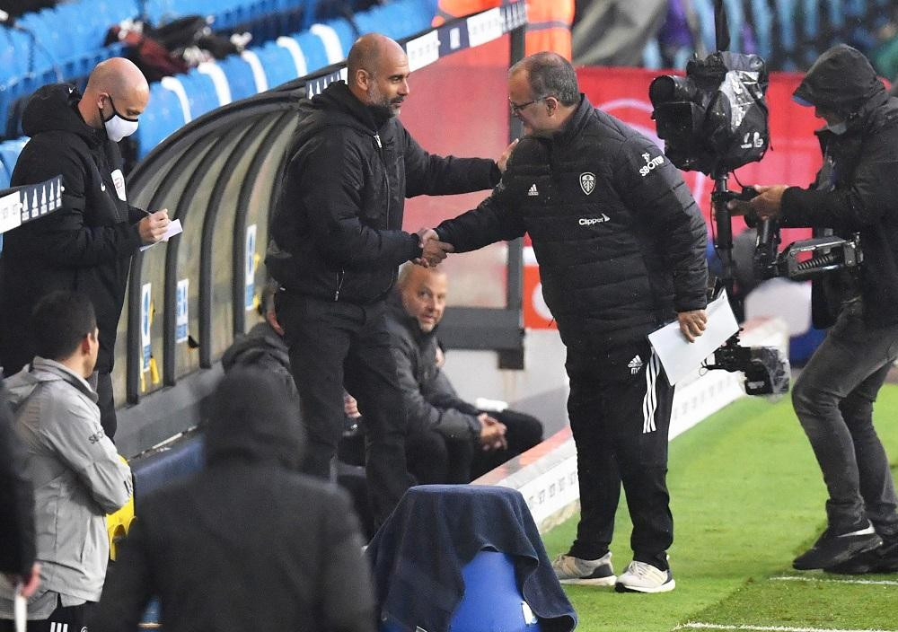 Pep Guardiola y Marcelo Bielsa, Reuters