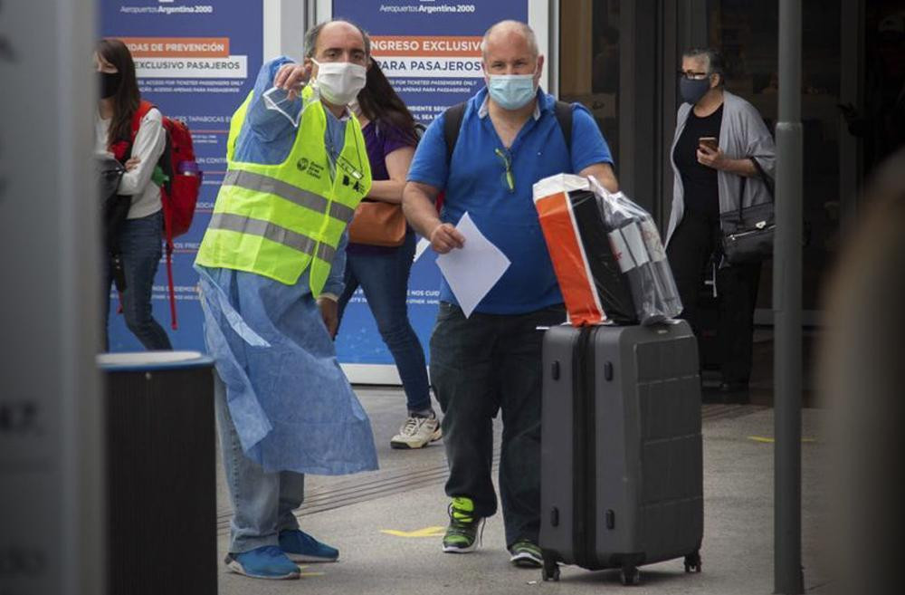Coronavirus, Argentina, pandemia, llegada de turistas a Ezeiza, NA