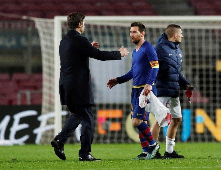 Mauricio Pochettino y Lionel Messi, Reuters