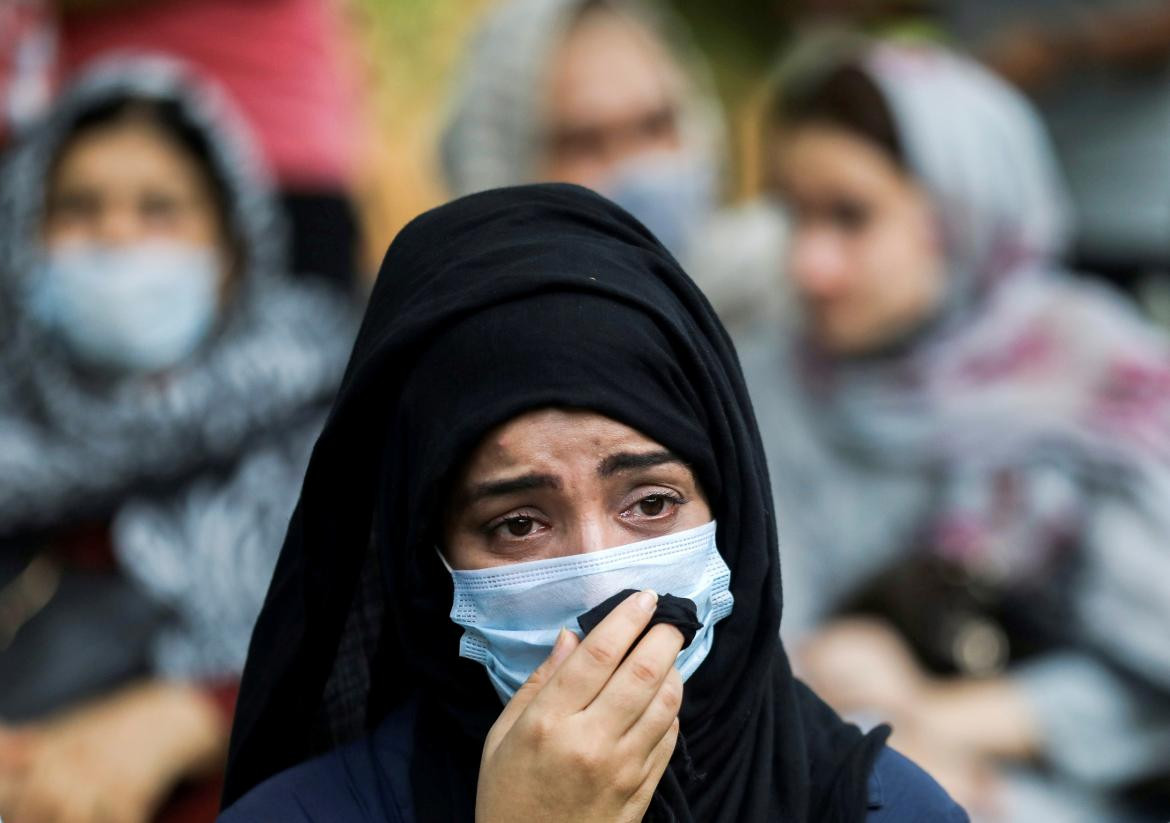 Mujer afgana en Centro de refugiados, Reuters
