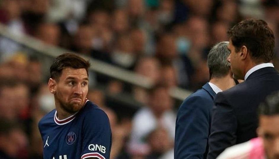 Lionel Messi y Mauricio Pochettino, Reuters