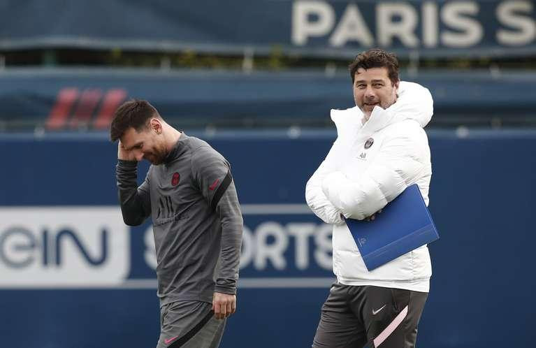 Lionel Messi y Mauricio Pochettino, Reuters