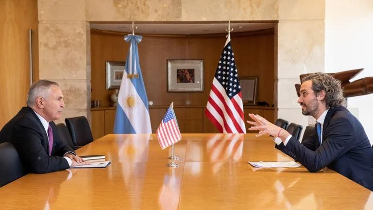 Marc Stanley junto a Santiago Cafiero