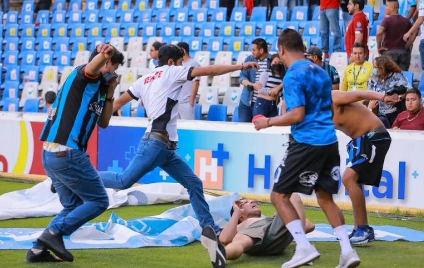 Ataque de hinchas del Querétaro al Atlas en el futbol mexicano, AGENCIA NA