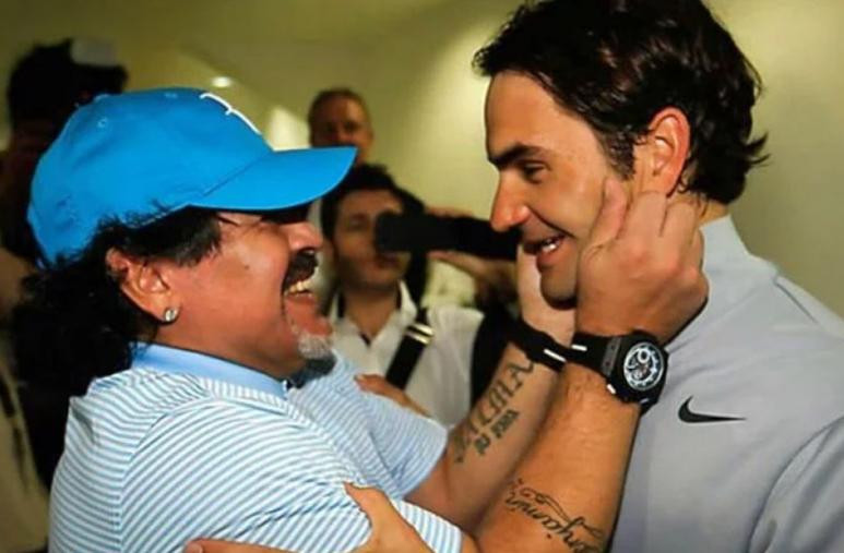 Roger Federer y Diego Maradona. Foto: NA.