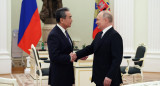 Vladimir Putin y Wang Yi, Reuters