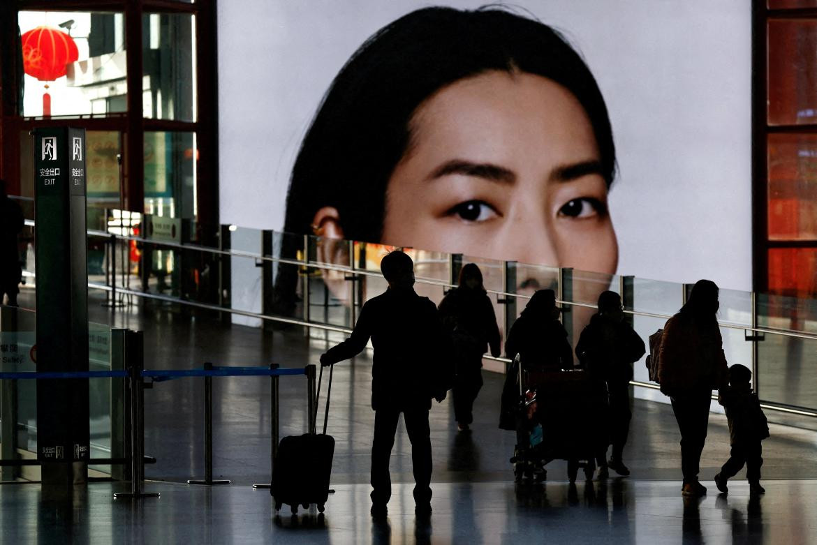 Turistas en aeropuerto en China. Foto: Reuters. 