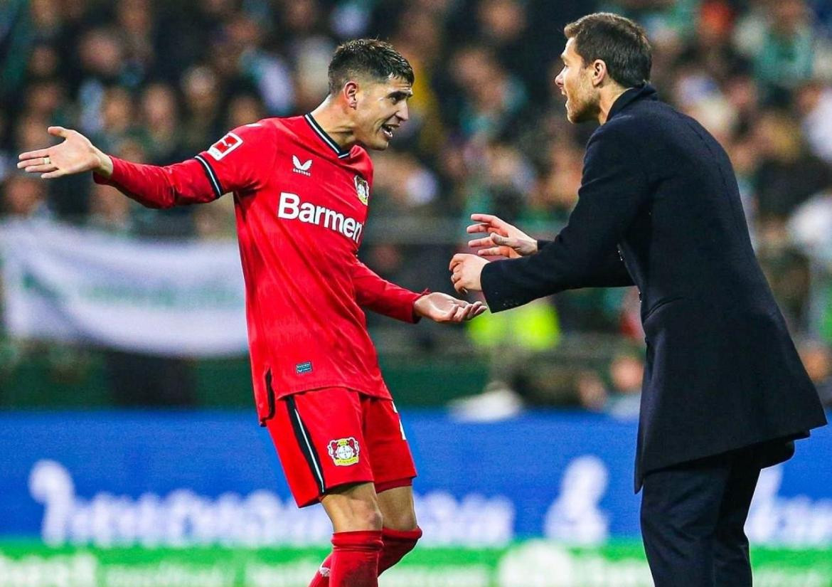 Exequiel Palacios y Xabi Alonso.