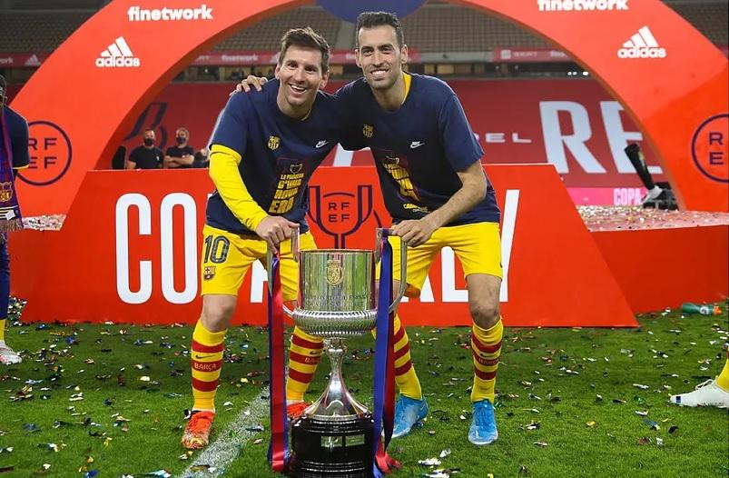 Sergio Busquets y Lionel Messi. Foto