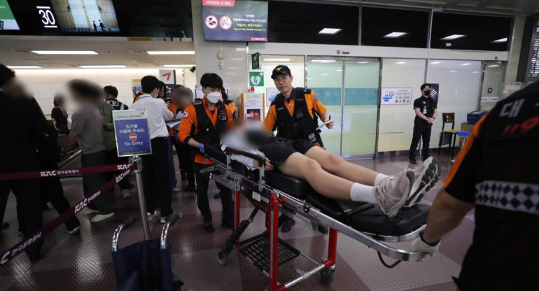 Corea del sur:un pasajero abrió la puerta de emergencia. Asiana Airlines 
