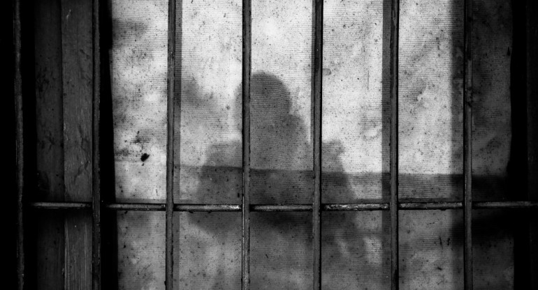 Mujer encarcelada. Foto: Unsplash