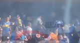 Golpiza a un hincha de River infiltrado en La Bombonera. Foto: Captura de video.