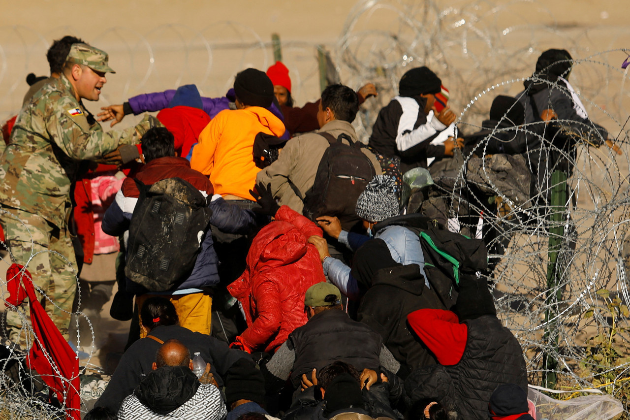 Migrantes en la frontera entre México y Estados Unidos. Foto: Reuters.