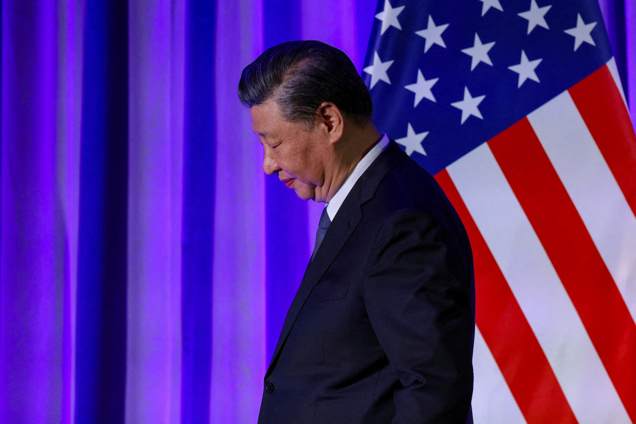 Chinese President Xi Jinping walks while attending a senior Chinese leaders event held by the National Committee on US-China Relations.  Reuters