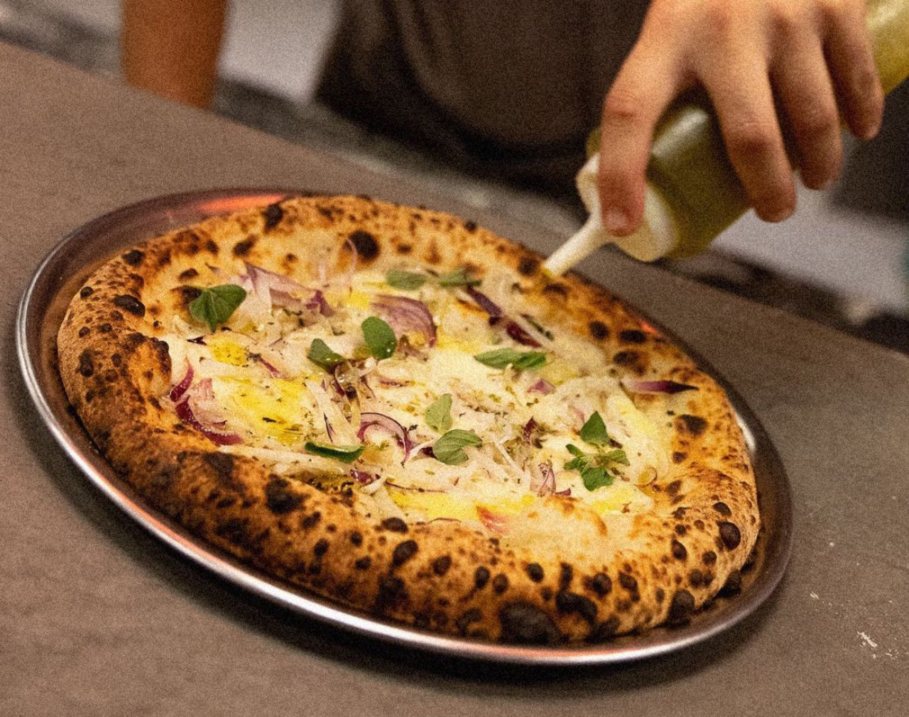Pizzería. Foto/Instagram: @pompeyapizza_
