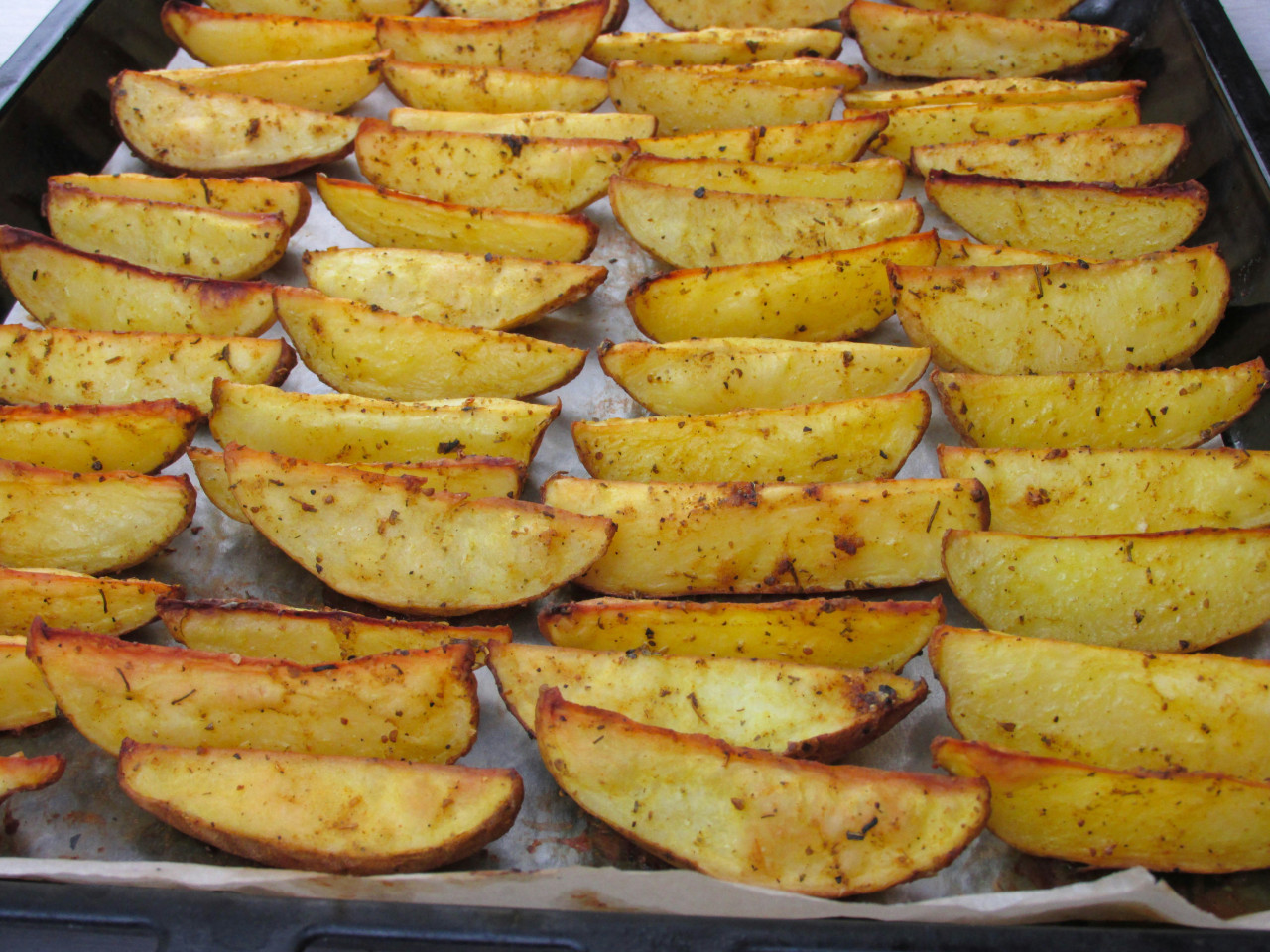 Papas con queso parmesano. Fuente: Pexels