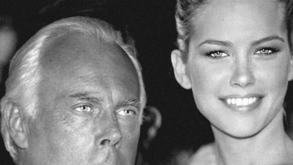 Valeria Mazza junto a Giorgio Armani.