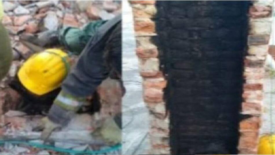 Bomberos intentando sacar al ladrón. Foto: NA.