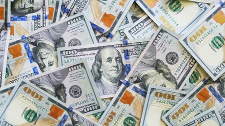 Billetes de 100 dólares. Foto: Unsplash.