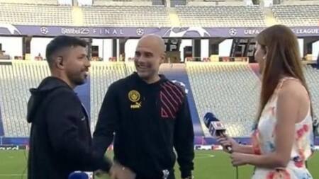 Divertido cruce entre Pep Guardiola y Kun Agüero en la previa de la Champions League. Foto: NA.