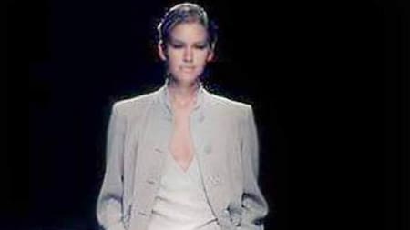 Valeria Mazza junto a Giorgio Armani.