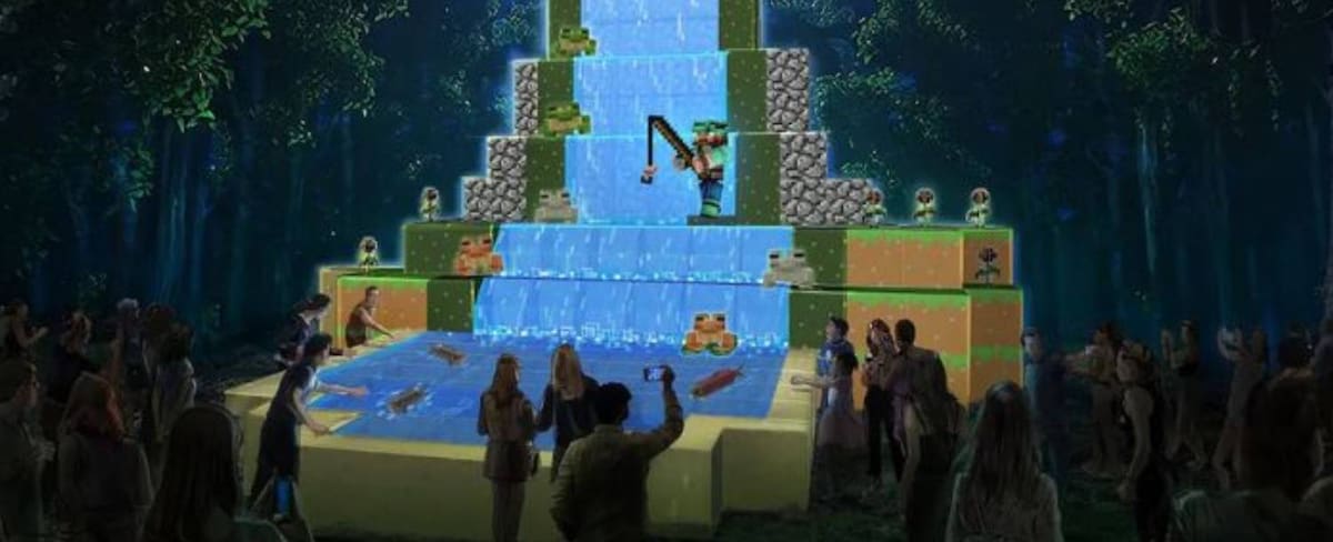 Niños y familias recorriendo un sendero iluminado inspirado en Minecraft, con escenarios de cuevas, cascadas y personajes del videojuego en una experiencia nocturna al aire libre.