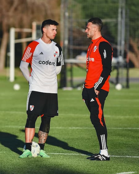 Adam Bareiro y Martín Demichelis durante su paso por River.