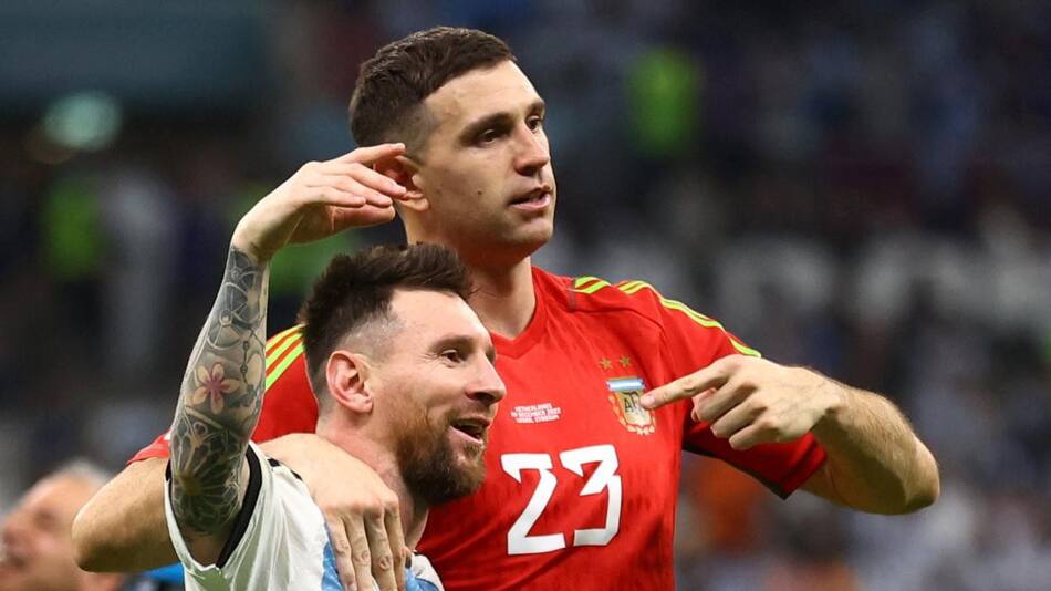 Lionel Messi y Emiliano Martínez. Foto: NA.