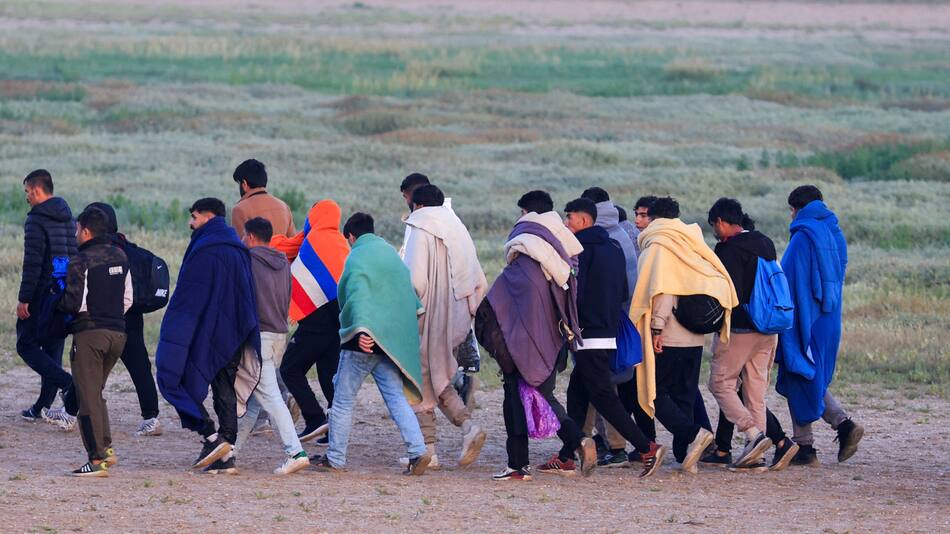 Migrantes en Reino Unido. Foto: Reuters.