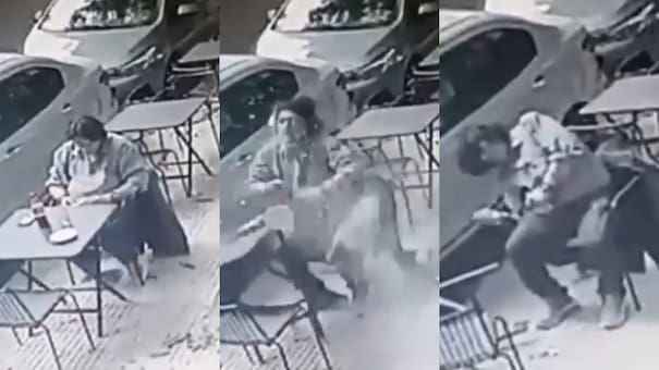 Vivo, pero de milagro: comía en la vereda y le cayó un blindex en la cabeza