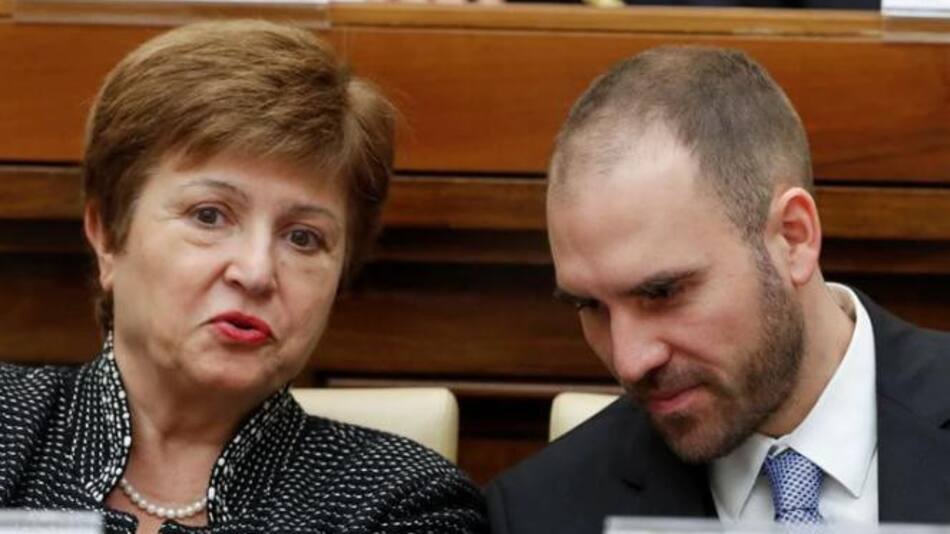 Martín Guzmán y directora de FMI