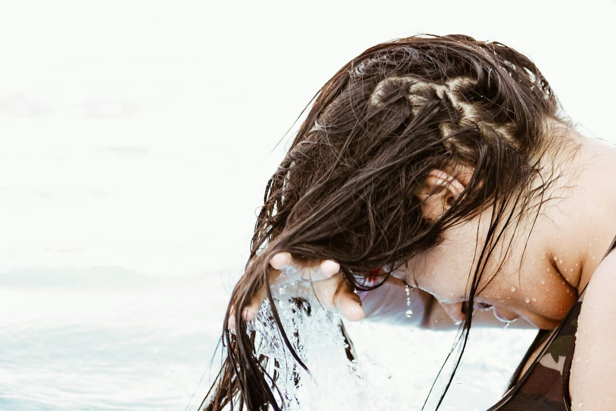 Lavado de pelo. Fuente: Pexels
