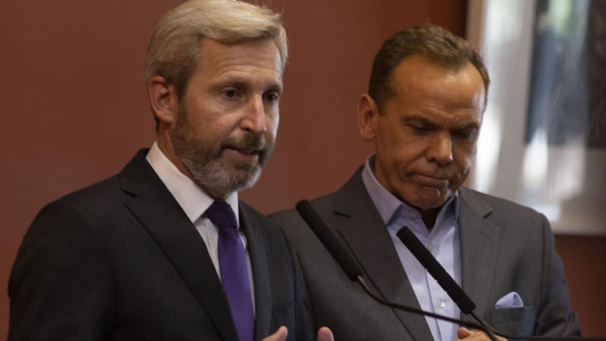 Rogelio Frigerio junto al director nacional de Migraciones, Horacio García, NA