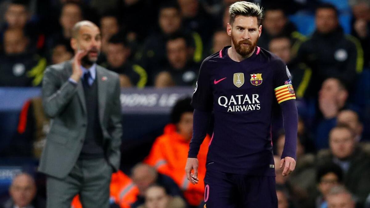 Pep Guardiola y Lionel Messi, REUTERS