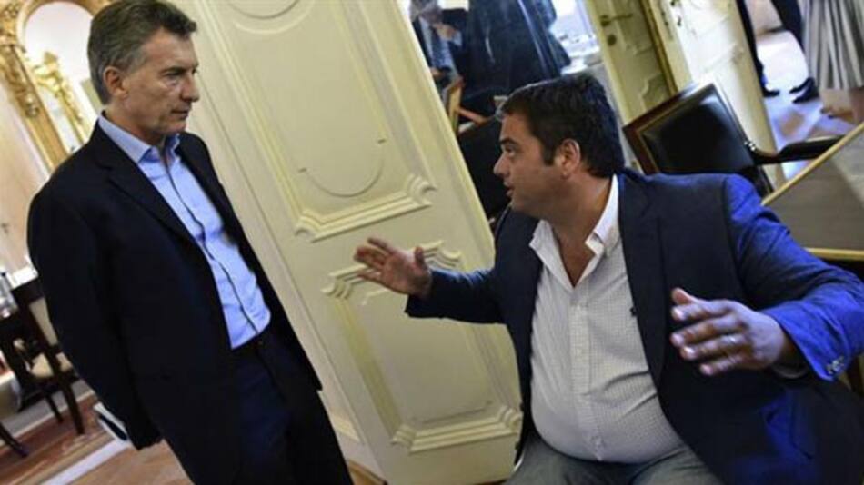 Macri y Triaca