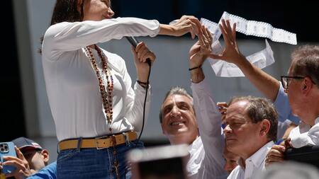 María Corina Machado y Biagio Pilieri en marcha en Caracas. Foto: REUTERS.