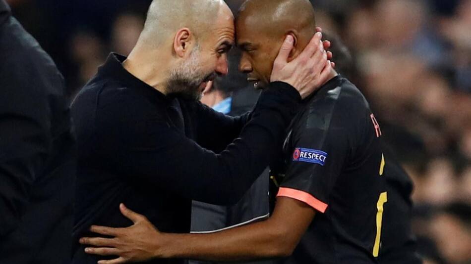 Pep Guardiola y Ferdandinho, Reuters