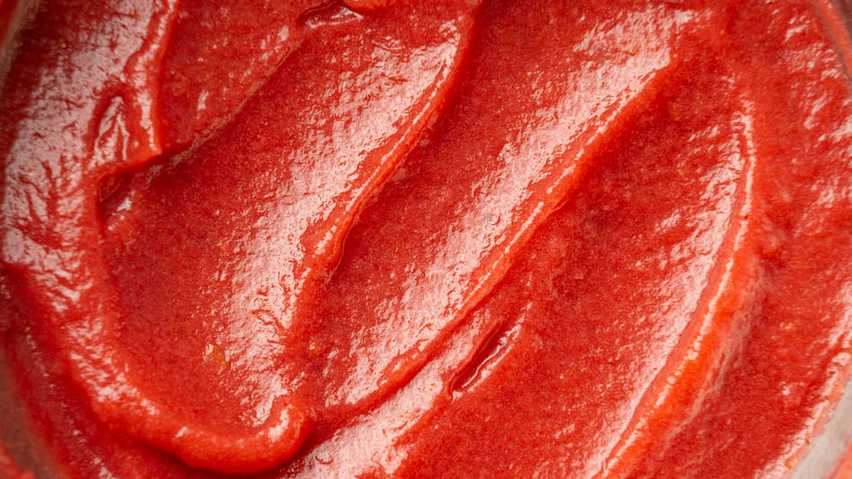 Tomate triturado.