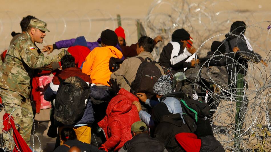 Migrantes en la frontera entre México y Estados Unidos. Foto: Reuters.