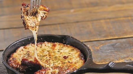 La provoleta argentina entre las comidas más destacadas. Foto NA.