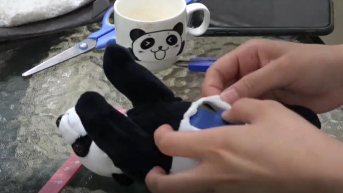 Oso panda de peluche
