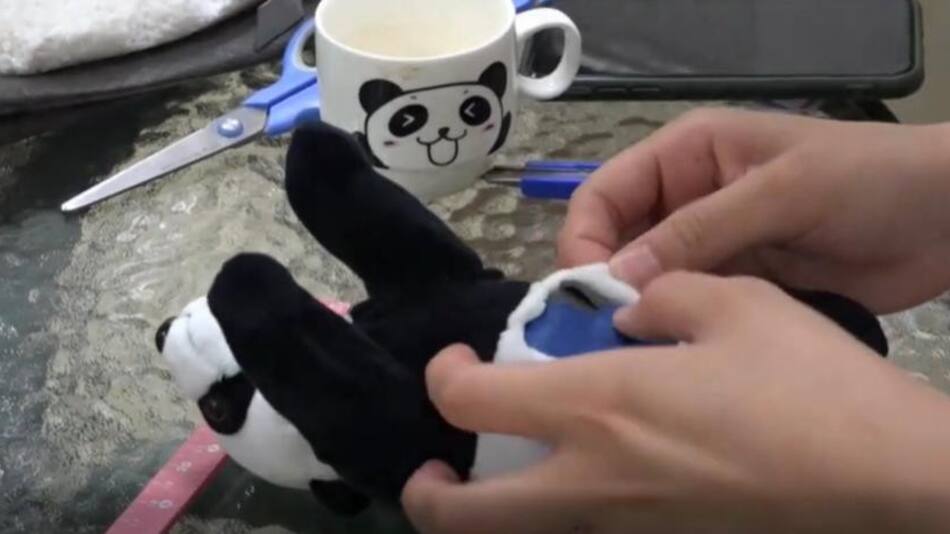 Oso panda de peluche