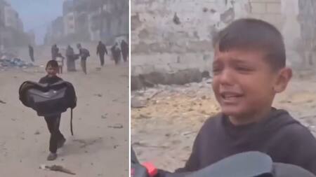 Niños palestinos piden ayuda humanitaria en Gaza. Foto: Reuters