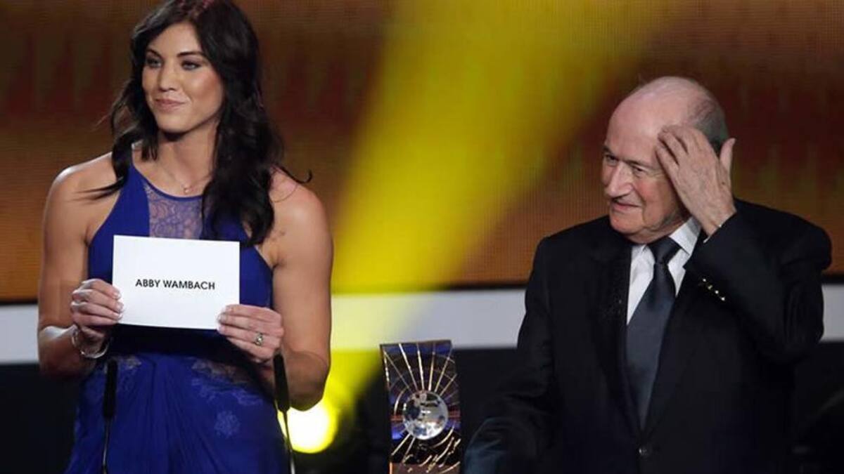 Hope Solo y Joseph Blatter
