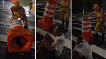 Insólito: encontraron un hombre dentro de un cono. Foto captura.