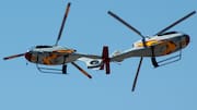 Helicópteros acróbatas de la Patrulla Aspa del Ejército Español