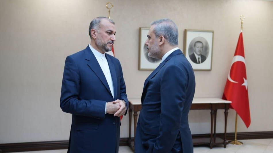 Ministros de Exteriores de Irán y Turquía. Foto: Reuters.