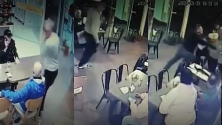 A las piñas por un diario en una estación de servicio en Rafaela. Foto: captura video.